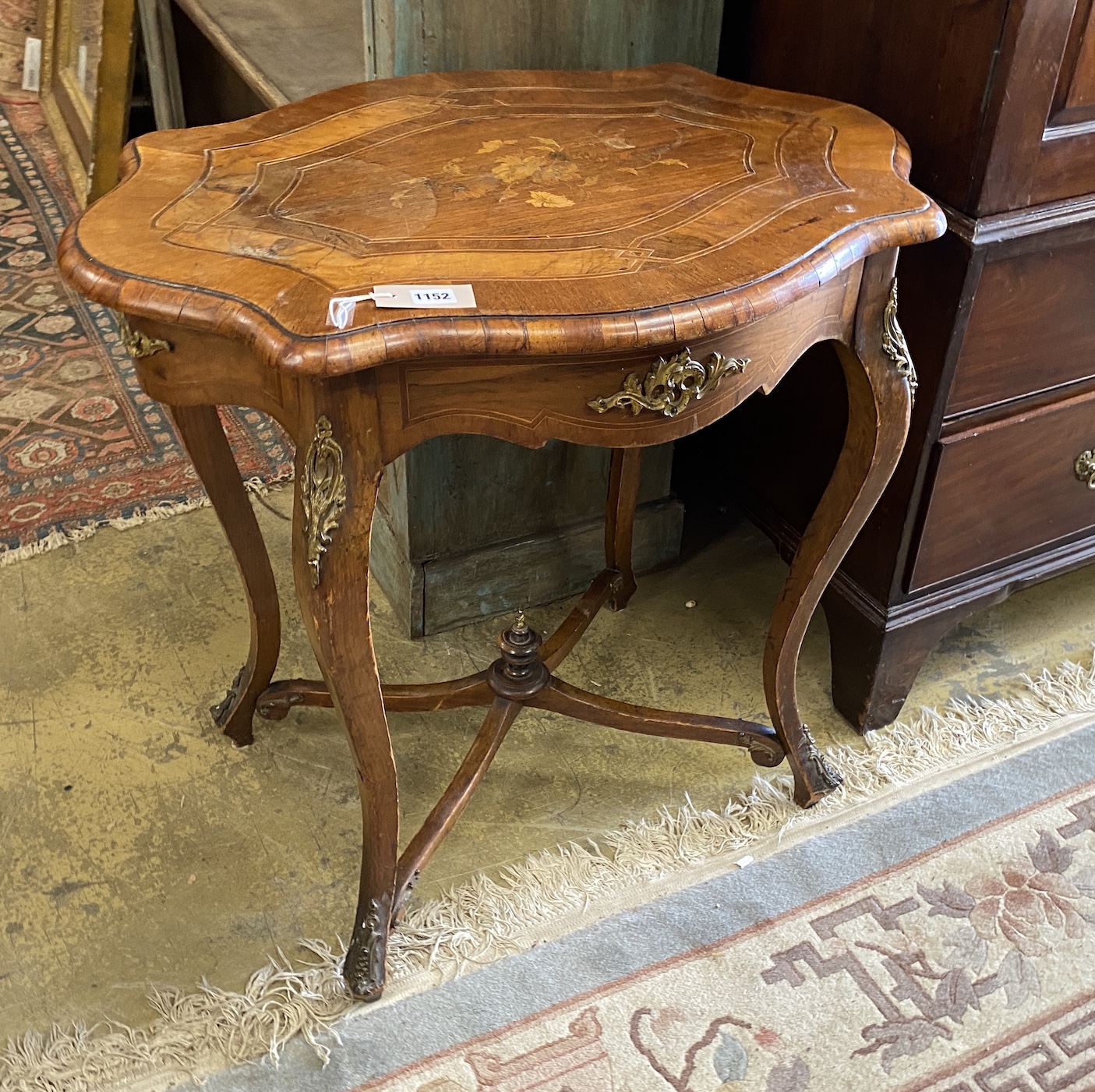 A 19th century French gilt metal mounted marquetry inlaid walnut oval centre table, width 78cm, depth 56cm, height 75cm